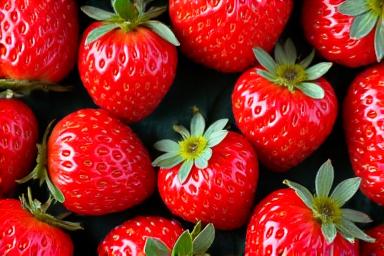 Punnet of fresh organic strawberries